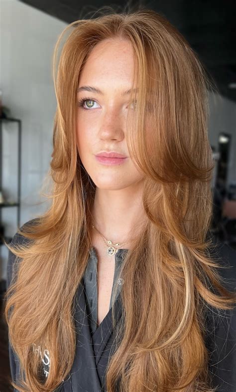 soft golden honey ginger long layers  curtain bangs