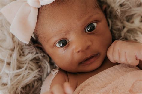 newborn baby girl  brown eyes