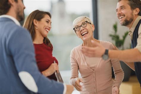 Free Stock Photo of Business people sharing a laugh in office ...