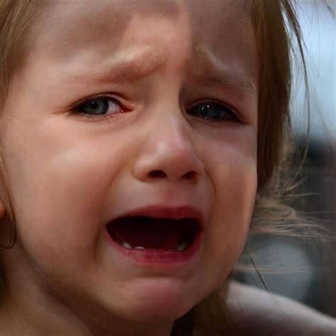 premium photo close  portrait  cute girl crying