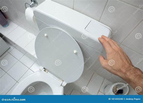 humans hand  toilet flush stock photo image  finger closet