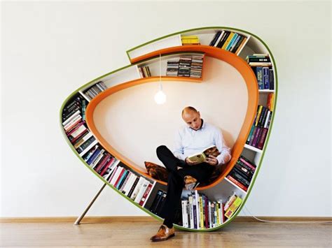 Необычные книжные полки, шкафы и подставки для книг (31 фото)