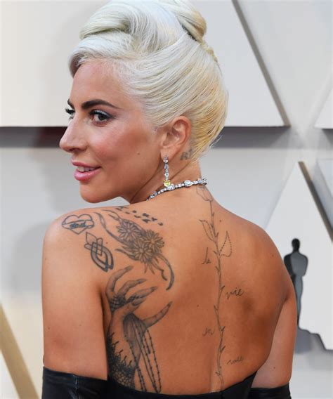 Forget the gold statue — lady gaga s back tattoos already won at the