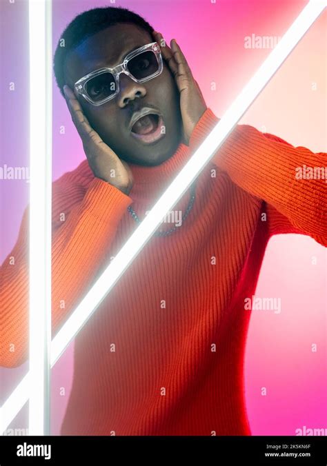 surprised man omg expression wow face neon light stock photo alamy