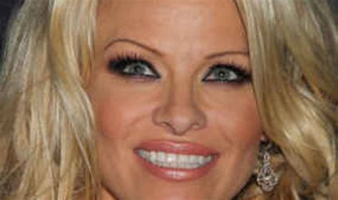 Pamela Anderson handed Dame Vivienne Westwood a rainforest gift ...