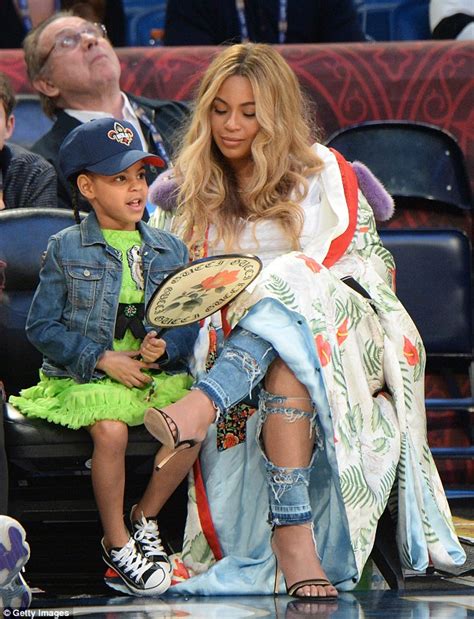 Beyonce treats Blue Ivy to cotton candy at NBA game | Daily Mail Online