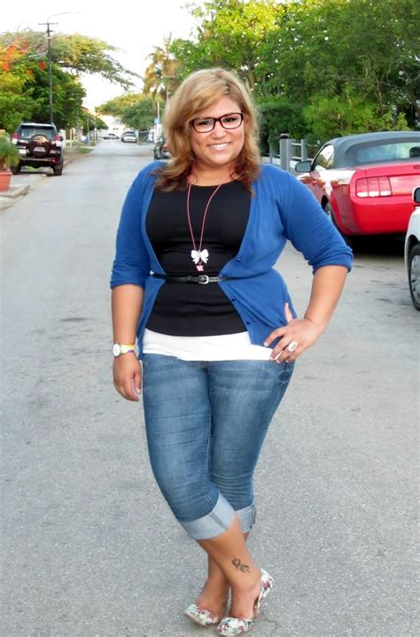 try wearing a skinny belt on the outside of an open cardigan to