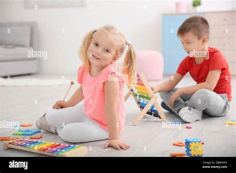cute  children playing  home stock photo alamy