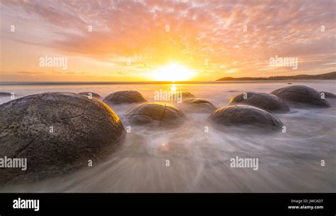 Moeraki boulders, at sunrise, geological formation, Koekohe Beach, Moeraki, East Coast, Otago ...