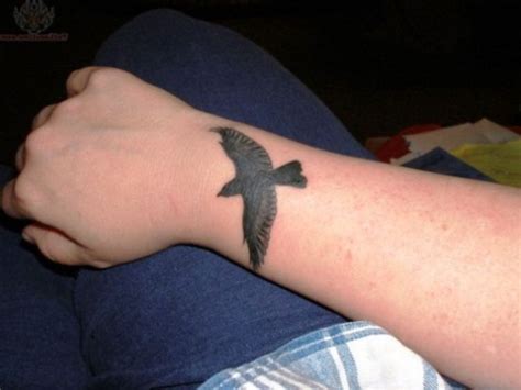 Raven Tattoos | Wrist tattoos, Raven tattoo, Cool wrist tattoos