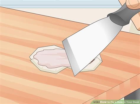 how to fix a hole in a desk