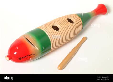 how to play guiro instrument