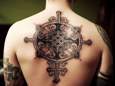Upside Down Cross Tattoo Meaning & Symbolism (Humility)