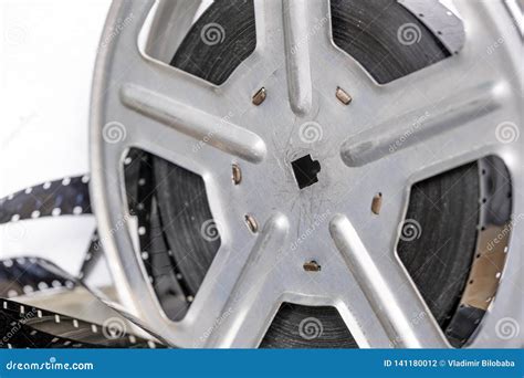 Metal reel with retro film stock photo. Image of reel - 141180012