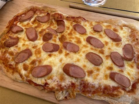 Charlie - Tried to order a sausage pizza in the small town of Spello
