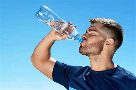 man drinking water  running portrait stock image everypixel