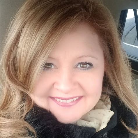 Regina Russell, Real Estate Agent,NL