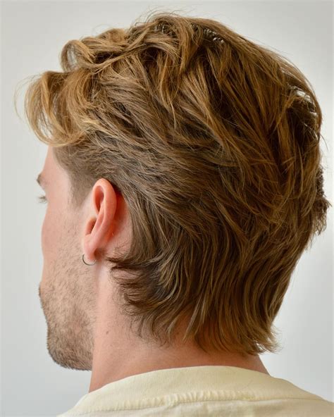 Longer hairstyles for men are making a major comeback today 27