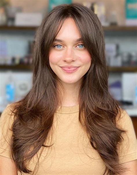 effortlessly glam curtain bangs  layers