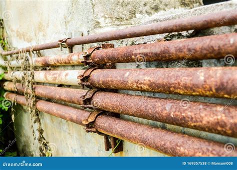 Rust metal pipes stock photo. Image of tube, industrial - 169357538