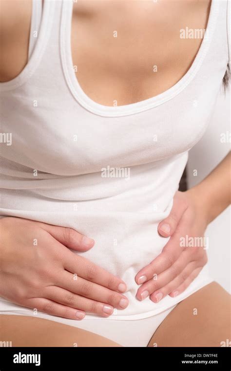 woman with acute abdominal pain Stock Photo - Alamy