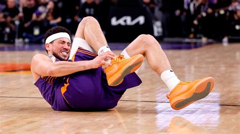 How long is Devin Booker out? Ankle injury timeline, return date ...