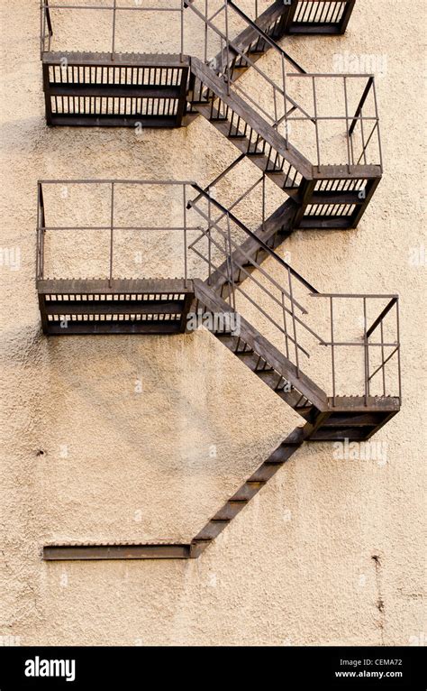 Old building metal emergency exit stairs leading down Stock Photo - Alamy