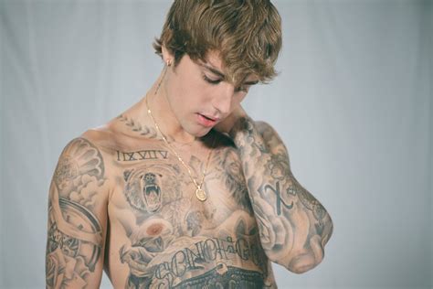 Justin Bieber on the Meaning Behind His Tattoos and Why He Won't Get ...