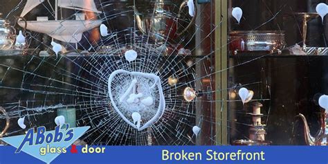 broken storefront abobs glass repair