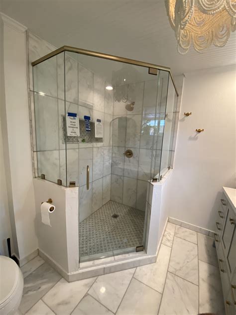 BEAUTIFUL BRUSHED BRONZE NEO ANGLE SHOWER - Shower Doors of Austin