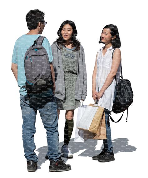 cut out three young asian people with shopping bags standing and