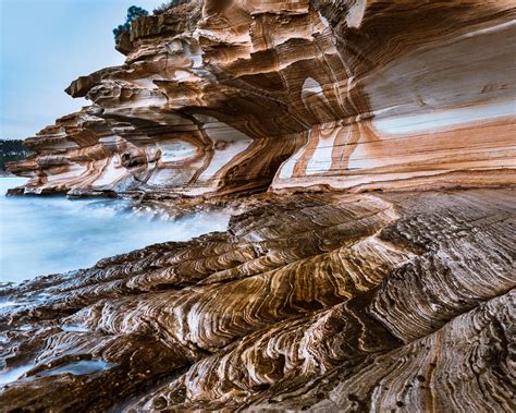 painted cliffs  blue hour maria island tasmania aus