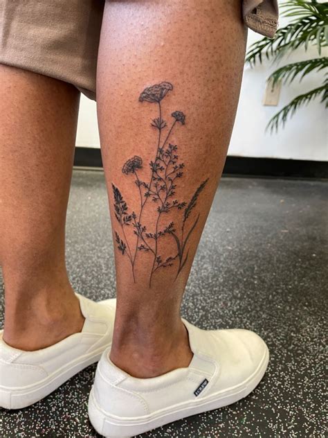 flower tattoo   leg stylish meaningful body art