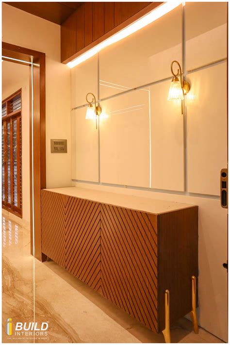 Modern Foyer Unit Design with Veneer Base Cabinet and Closed Shutter