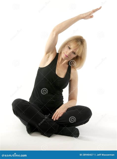 Mature Blond Woman Doing Yoga Stretching Exercise Stock Image - Image