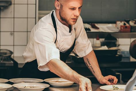 chef making dish  kitchen man chef uniform serving piqsels