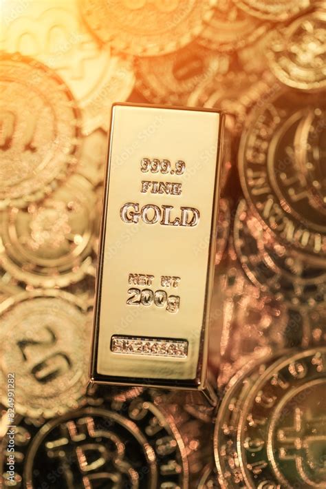 Gold bars in gold coins Stock Photo | Adobe Stock