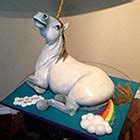 A Unicorn Farting A Rainbow Cake