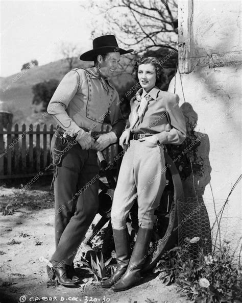 Wild Bill Elliott trying to get lucky with Iris Meredith.... western