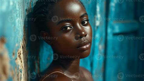 AI generated A beautiful black woman leaning against a blue wall