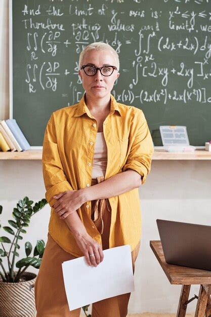 Premium Photo | Teacher standing in the classroom at school