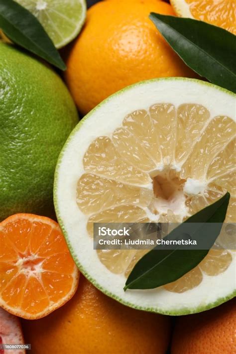 fresh   cut citrus fruits  background top view