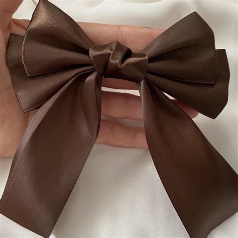 Brown Bow small hair clip 💫 #Hair clip #bow hair... - Depop