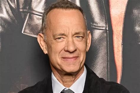 Furious Tom Hanks screams and swears at fans to 'back off' as wife Rita knocked over in mob ...