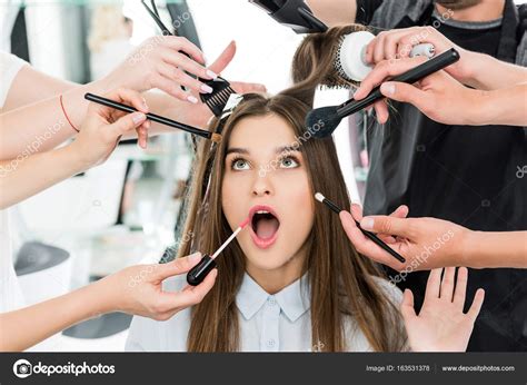 Woman in beauty salon getting styling — Stock Photo © DimaBaranow ...