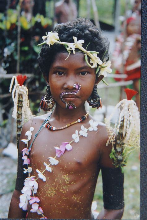 Young Trobriand Island Girl, PNG, with body decorated with flowers
