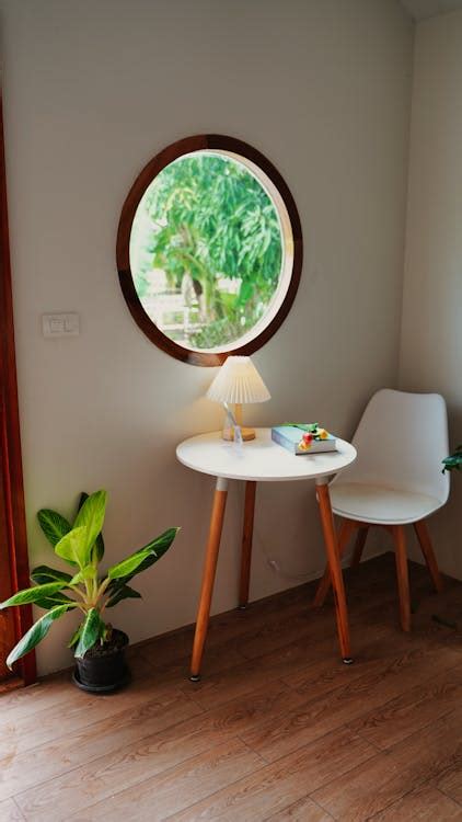 Modern Style Interior with a Circular Window · Free Stock Photo