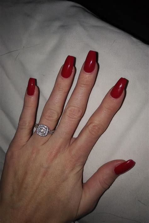 Red Nails / We love a classic, glossy red polish, but with the addition