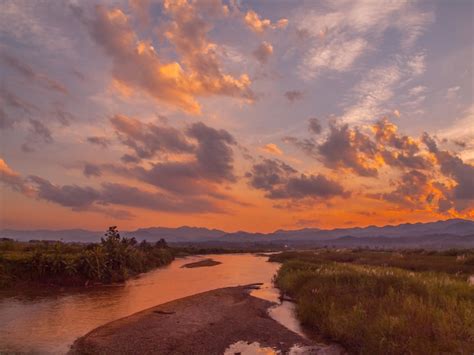 Premium Photo | River in the sky sunset