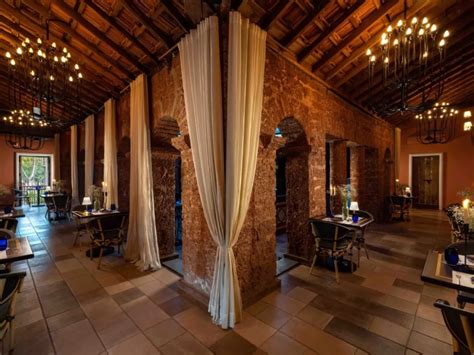 rustic restaurant   land  flowers goa  designs